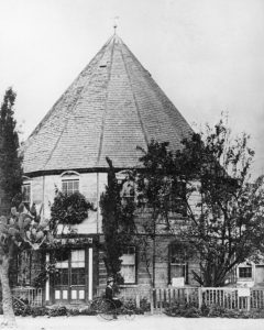 Round_House_on_Main_Street_south_from_Third_Street,_Los_Angeles,_ca.1880-1885_(CHS-2873)